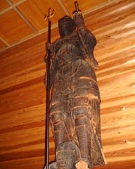 Wooden statue of Bishamonten with helmet